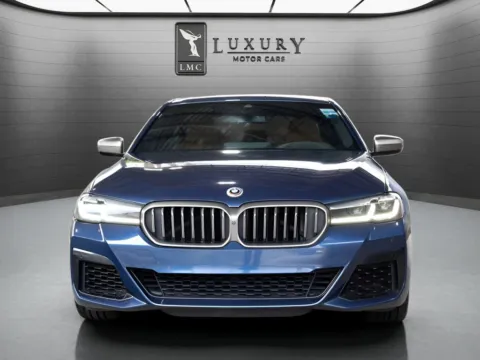 Another view of 2023 BMW 5 Series M550i xDrive for sale in Hillside, NJ at Luxury Motor Cars