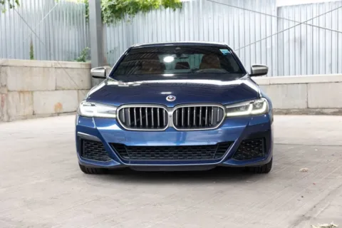 Another view of 2023 BMW 5 Series M550i xDrive for sale in Hillside, NJ at Luxury Motor Cars