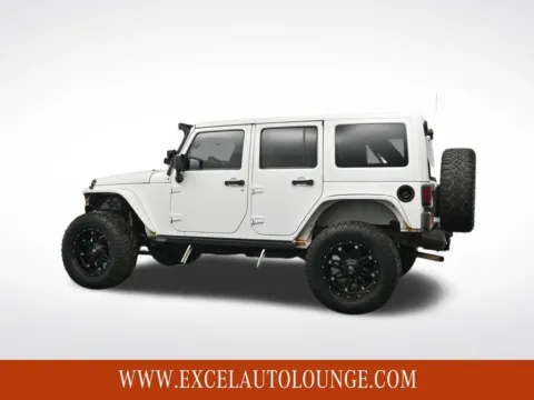 Another view of 2014 Jeep Wrangler Unlimited Sahara for sale in Hightstown, NJ at Excel Auto Lounge