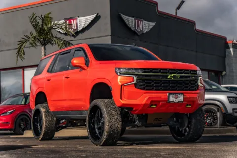 Orange 2021 Chevrolet Tahoe Z71 for sale in Evansville, IN