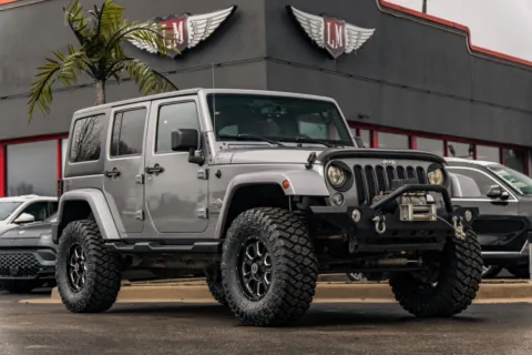 Silver 2015 Jeep Wrangler Unlimited Freedom Edition for sale in Evansville, IN