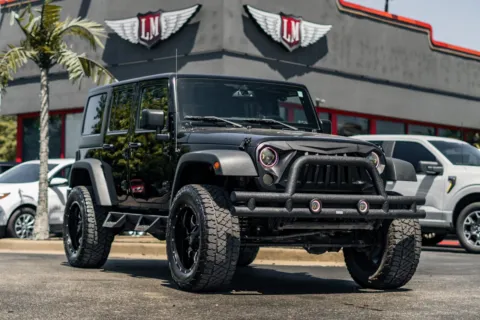 Black 2016 Jeep Wrangler Unlimited Sport for sale in Evansville, IN
