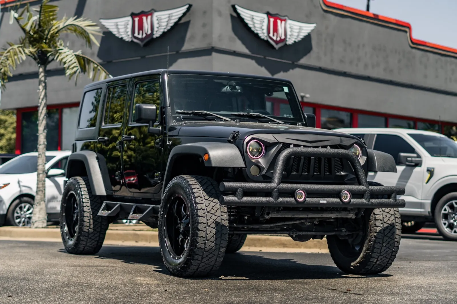 Black 2016 Jeep Wrangler Unlimited Sport for sale in Evansville, IN