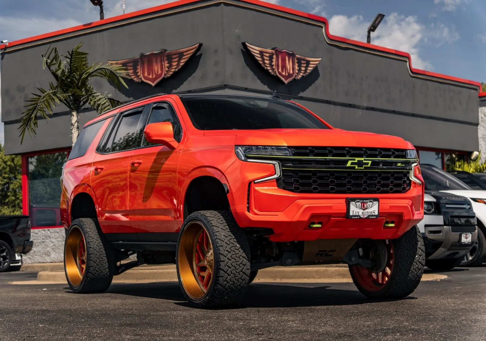 Orange 2021 Chevrolet Tahoe Z71 for sale in Evansville, IN