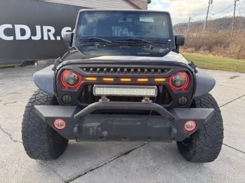 Photos of 2016 Jeep Wrangler Unlimited Sport for sale in Gallipolis, OH at Braden Chrysler Dodge Jeep Ram