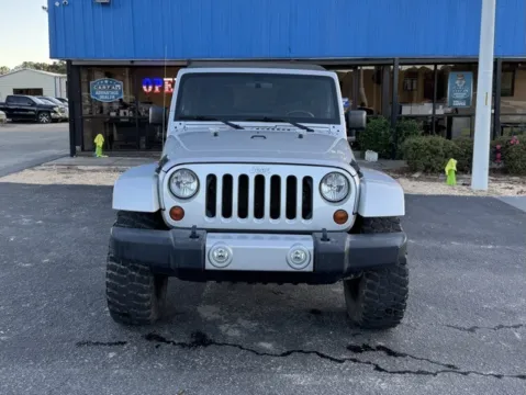 Another view of 2012 Jeep Wrangler Unlimited Sahara for sale in Clayton, NC at Frontline Motors Clayton