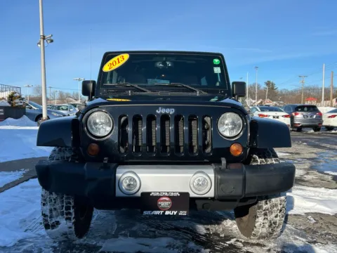Another view of 2013 Jeep Wrangler Unlimited Sahara for sale in Meriden, CT at Smart Buy Auto Sales