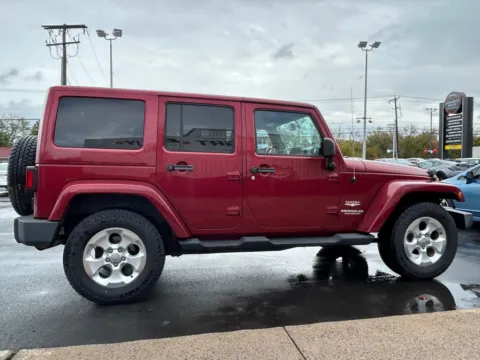 More photos of 2013 Jeep Wrangler Unlimited Sahara at Smart Buy Auto Sales, CT