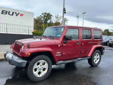 Photos of 2013 Jeep Wrangler Unlimited Sahara for sale in Meriden, CT at Smart Buy Auto Sales