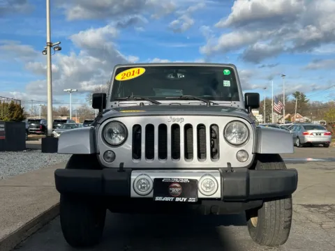 Another view of 2014 Jeep Wrangler Sahara for sale in Meriden, CT at Smart Buy Auto Sales