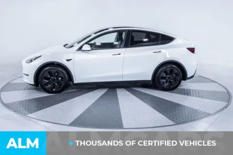 More photos of 2025 Tesla Model Y Long Range at ALM Kia South, GA