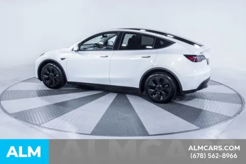 More photos of 2025 Tesla Model Y Long Range at ALM Kia South, GA
