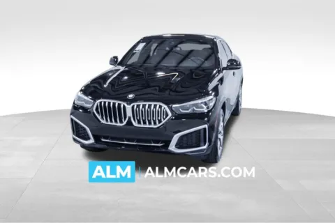Black 2022 BMW X6 xDrive40i for sale in Union City, GA
