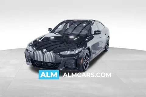 Black 2025 BMW i4 eDrive40 for sale in Union City, GA