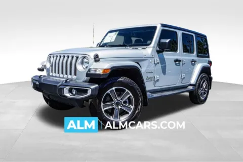 Silver 2023 Jeep Wrangler Sahara for sale in Kennesaw, GA