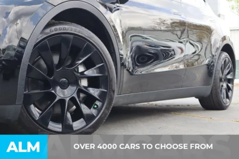 Another view of 2025 Tesla Model Y Long Range for sale in Duluth, GA at ALM Gwinnett