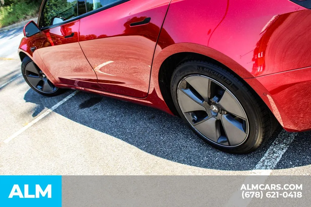 Tesla Model 3 photo 11