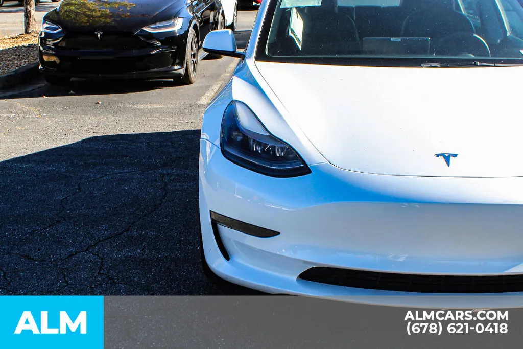 Tesla Model 3 photo 11