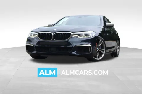 Black 2018 BMW 5 Series M550i xDrive for sale in Duluth, GA