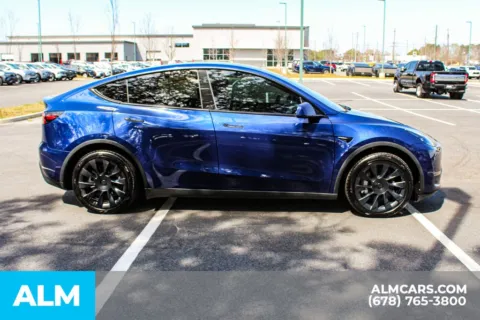 More photos of 2024 Tesla Model Y Long Range at ALM Mall of Georgia, GA