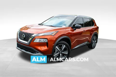 Orange 2021 Nissan Rogue SL for sale in Buford, GA