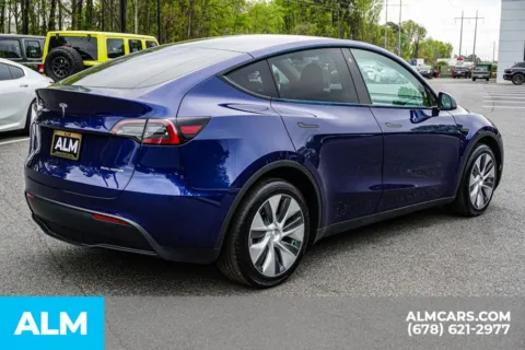 More photos of 2023 Tesla Model Y Long Range at ALM Marietta, GA