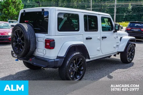 More photos of 2024 Jeep Wrangler Sahara 4xe at ALM Marietta, GA