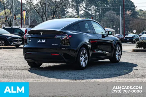 More photos of 2023 Tesla Model Y Long Range at ALM Newnan, GA