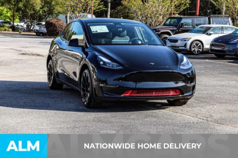 More photos of 2023 Tesla Model Y Long Range at ALM Newnan, GA