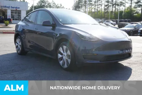 More photos of 2023 Tesla Model Y Long Range at ALM Newnan, GA
