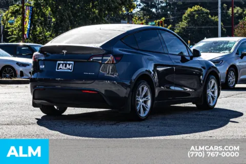 More photos of 2023 Tesla Model Y Long Range at ALM Newnan, GA