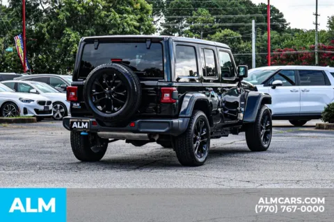 More photos of 2024 Jeep Wrangler Sahara 4xe at ALM Newnan, GA
