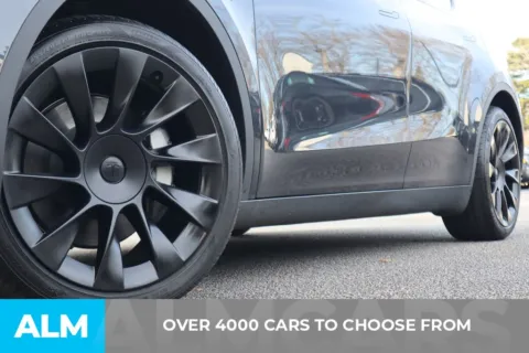 Another view of 2024 Tesla Model Y Standard Range for sale in Roswell, GA at ALM Roswell
