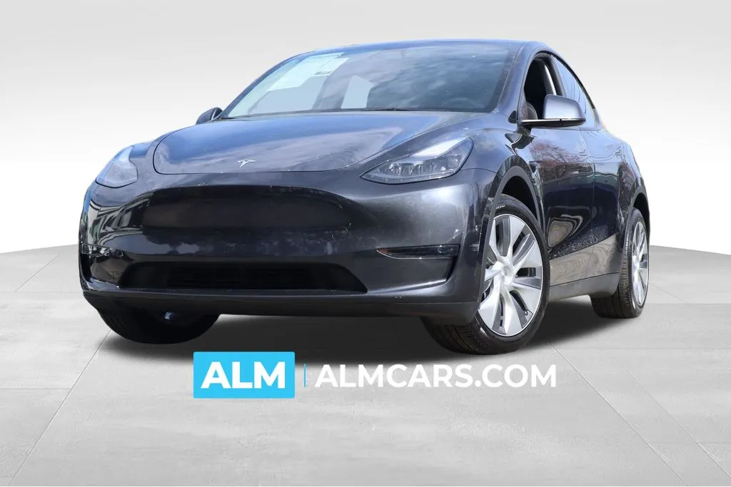 Used 2024 Tesla Model Y Long Range with VIN 7SAYGDEE1RA240523 for sale in Lumberton, NC