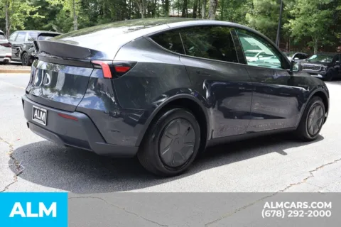More photos of 2026 Tesla Model Y Standard Range at ALM Roswell, GA