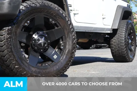 Photos of 2011 Jeep Wrangler Unlimited Sport for sale in Roswell, GA at ALM Roswell