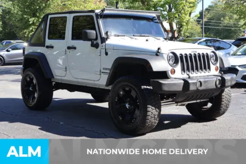 More photos of 2011 Jeep Wrangler Unlimited Sport at ALM Roswell, GA