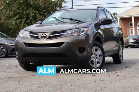 Brown 2014 Toyota RAV4 LE for sale in Roswell, GA