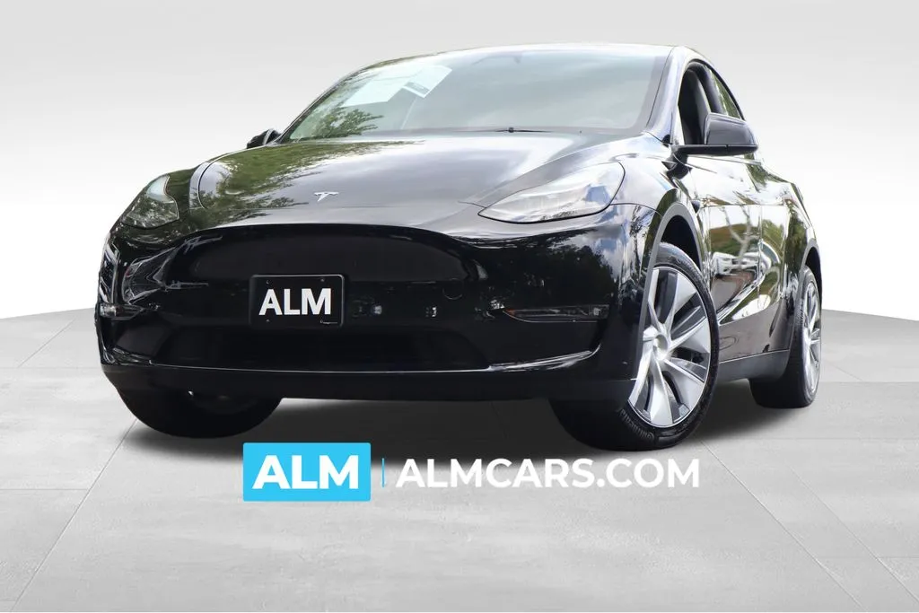 Used 2023 Tesla Model Y Long Range with VIN 7SAYGAEE0PF890913 for sale in Lumberton, NC