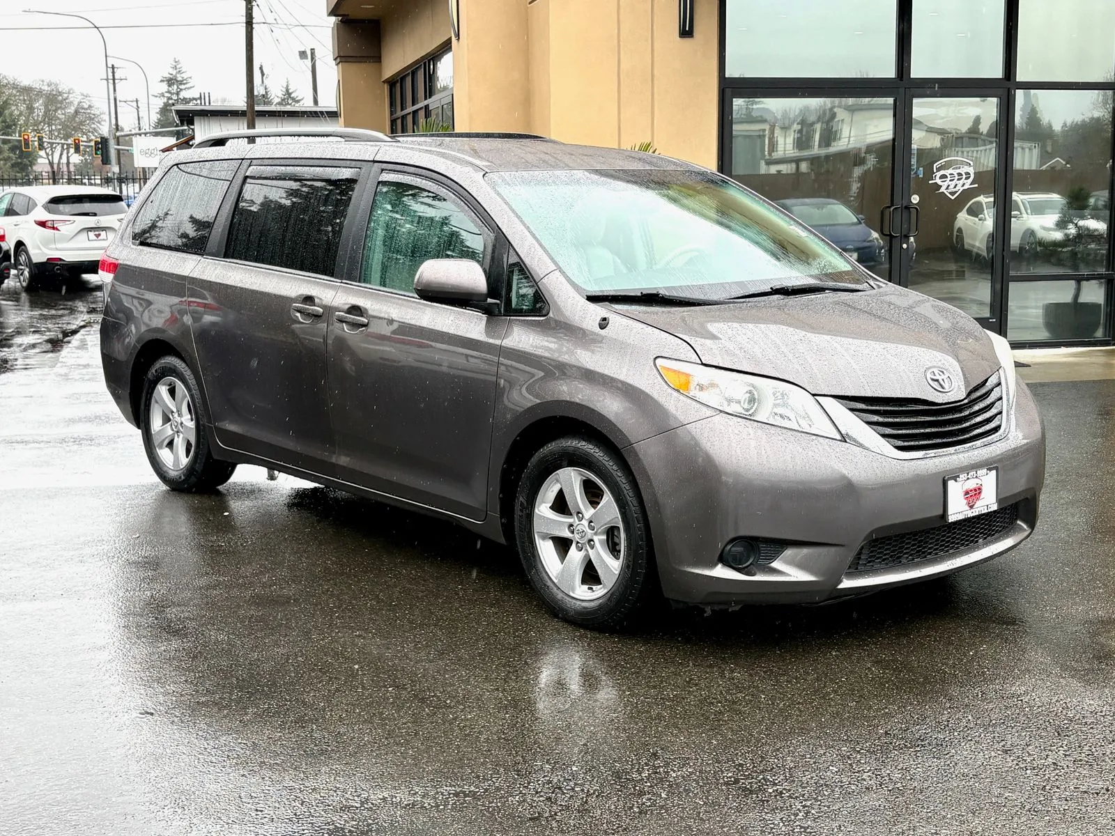 Gray 2013 Toyota Sienna LE for sale in Lakewood, WA