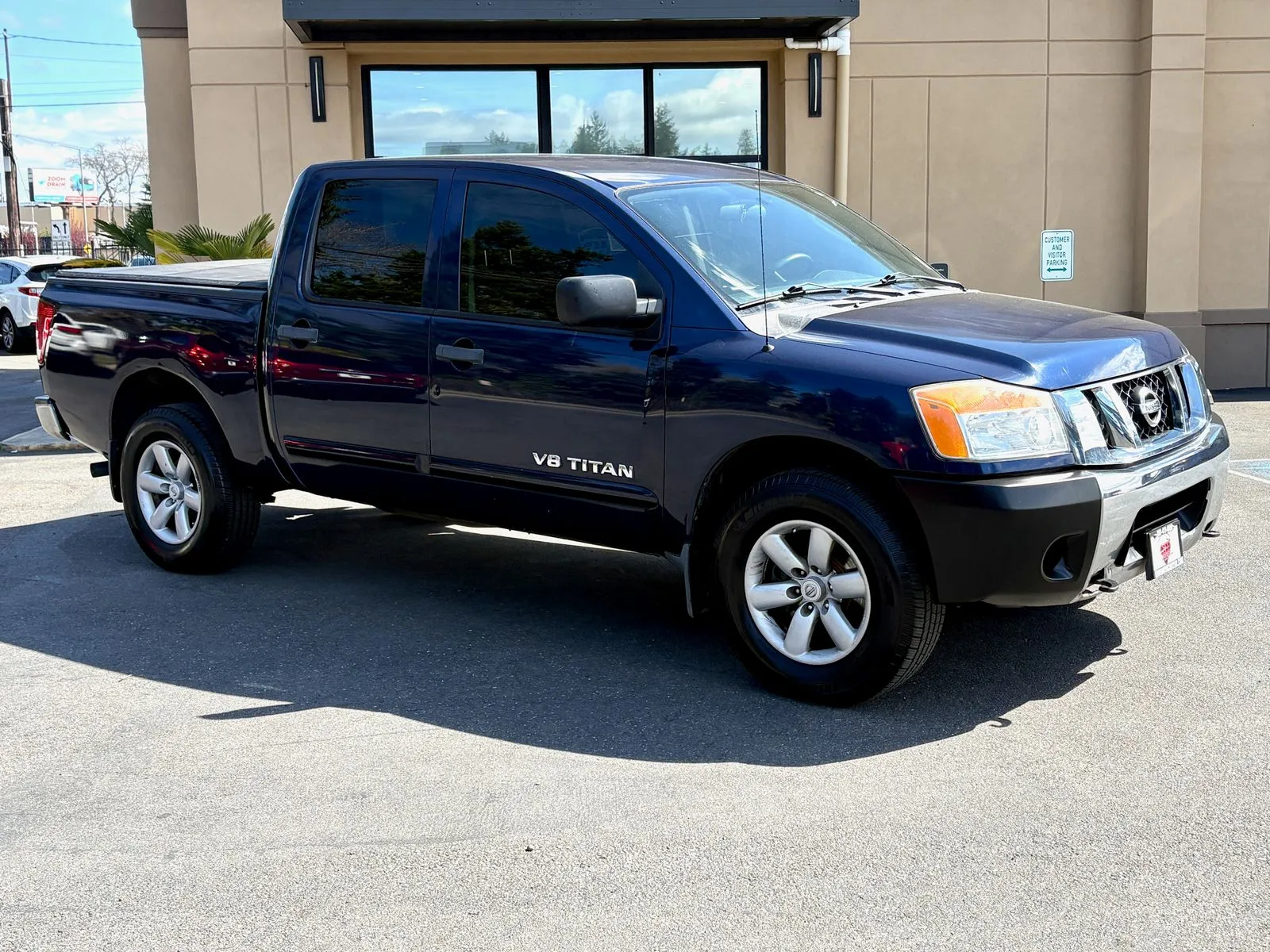 2010 Nissan Titan SE 4X4 Crew Cab SWB's photo