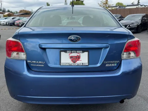 More photos of 2014 Subaru Impreza 2.0i at 9999 Auto Center, WA