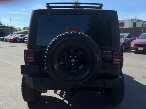 More photos of 2015 Jeep Wrangler Unlimited Sport at 9999 Auto Center, WA
