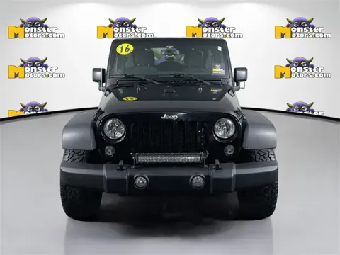 Photos of 2016 Jeep Wrangler Unlimited Sport for sale in Michigan Center, MI at Monster Motors - Jackson, MI