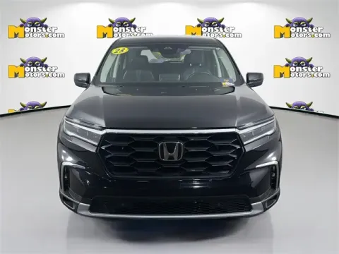 Photos of 2023 Honda Pilot EX-L for sale in Michigan Center, MI at Monster Motors - Jackson, MI