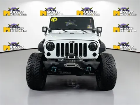 Photos of 2016 Jeep Wrangler Unlimited Sahara for sale in Michigan Center, MI at Monster Motors - Jackson, MI