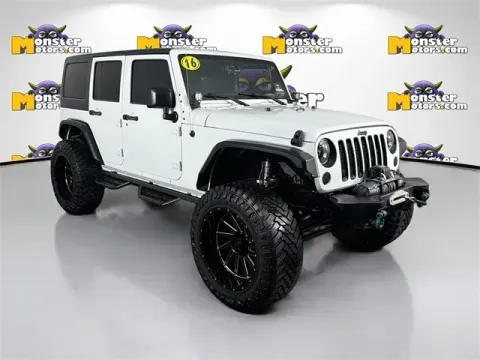 Another view of 2016 Jeep Wrangler Unlimited Sahara for sale in Michigan Center, MI at Monster Motors - Jackson, MI