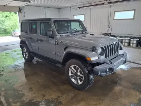 Another view of 2021 Jeep Wrangler Unlimited Sahara for sale in Michigan Center, MI at Monster Motors - Jackson, MI