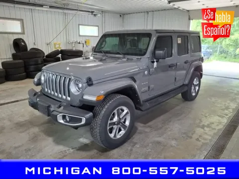 Gray 2022 Jeep Wrangler Unlimited Sahara for sale in Michigan Center, MI