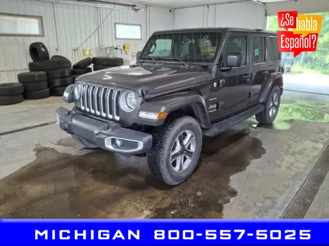 Gray 2021 Jeep Wrangler Unlimited Sahara for sale in Michigan Center, MI